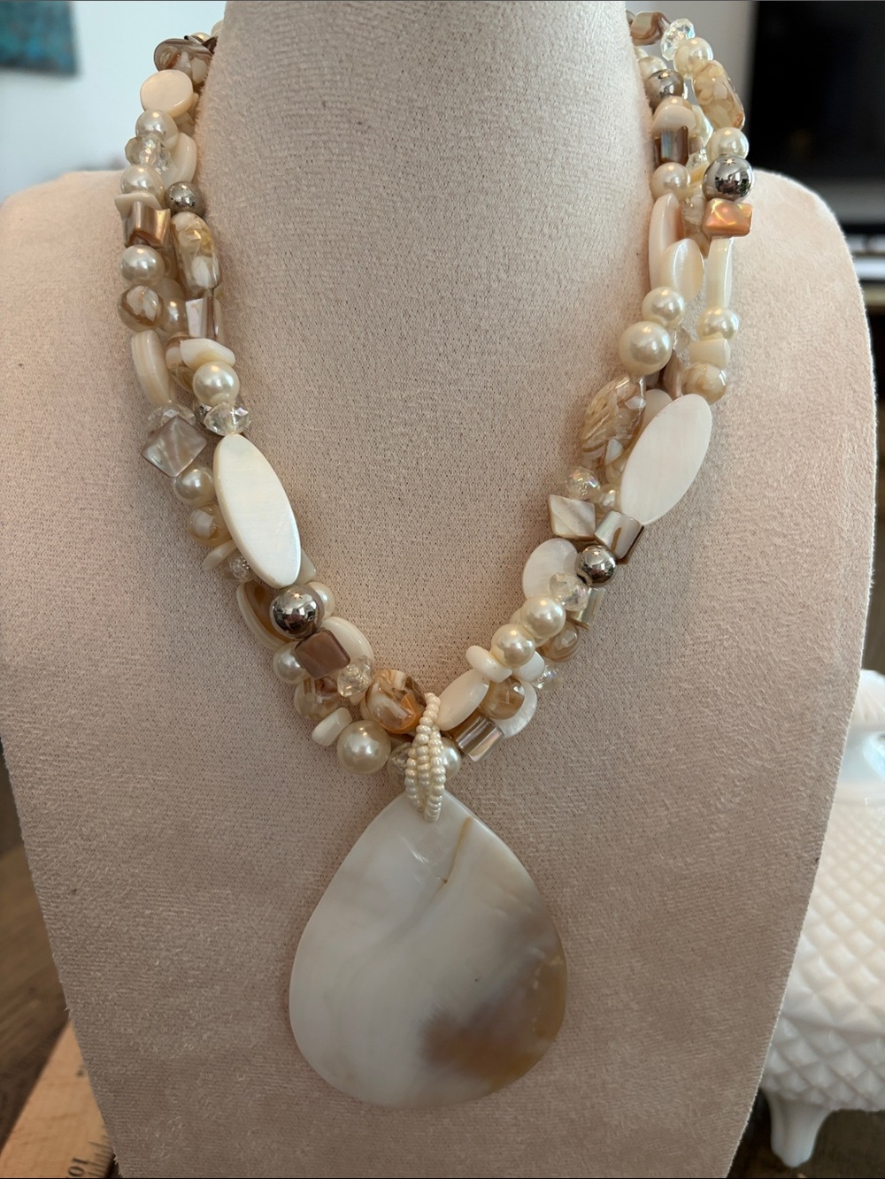Multi-Strand Cream and Gold Bead Necklace with Teardrop Pendant